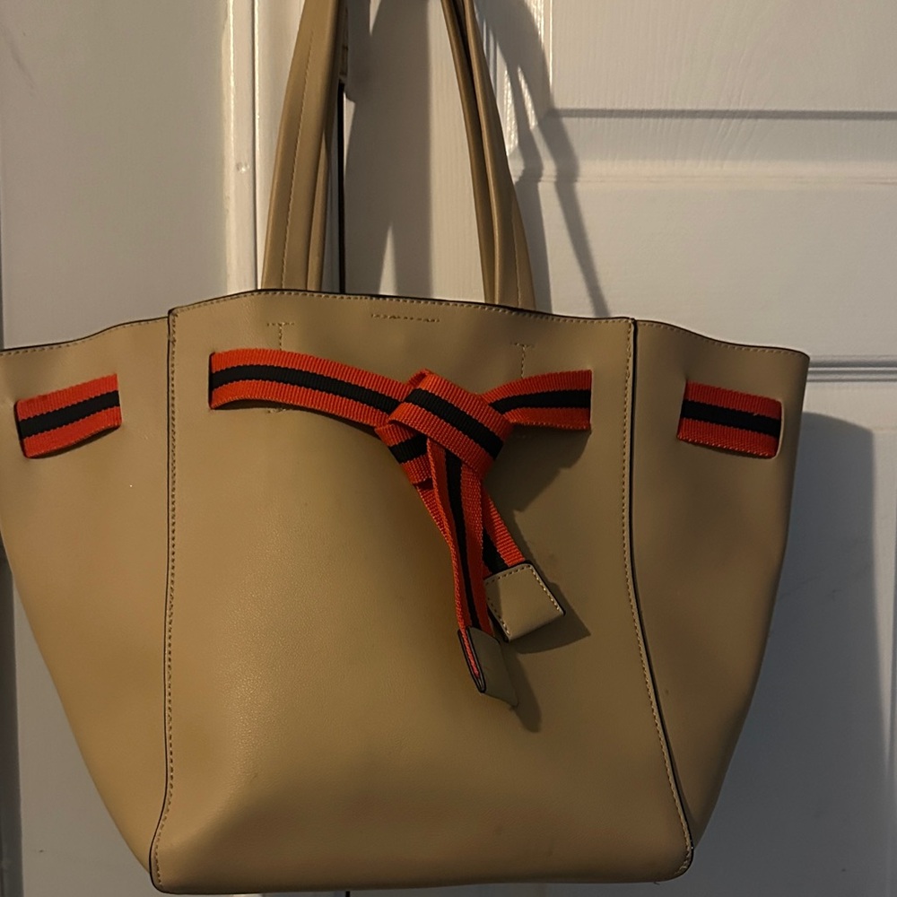Stylish Tan Tote Bag with Red Accents